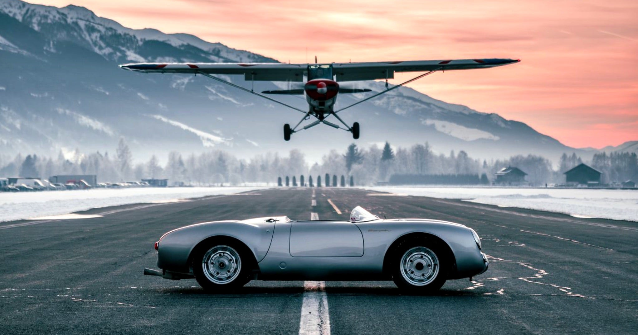 <span>A propeller plane flies overhead a vintage 550 Spyder to commemorate 2021&rsquo;s &ldquo;Cold Start by GP,&rdquo; a virtual iteration of the Ice Race due to the coronavirus pandemic</span> <br/><span class="caption-sub"><em>Photo credit: Max Zappolino</em></span>